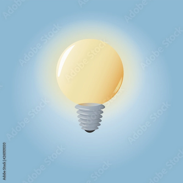 Obraz light bulb glows on a blue background