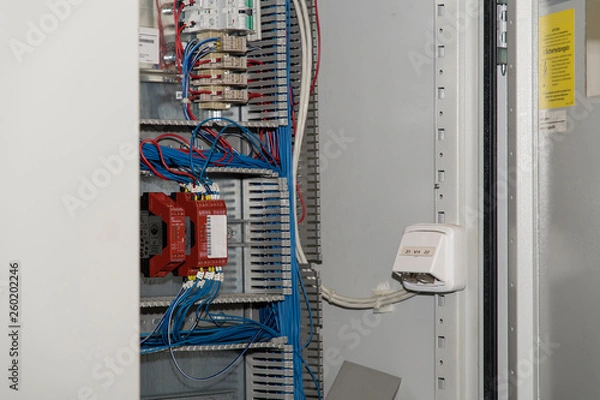 Fototapeta Part of the switchboard with electronics.