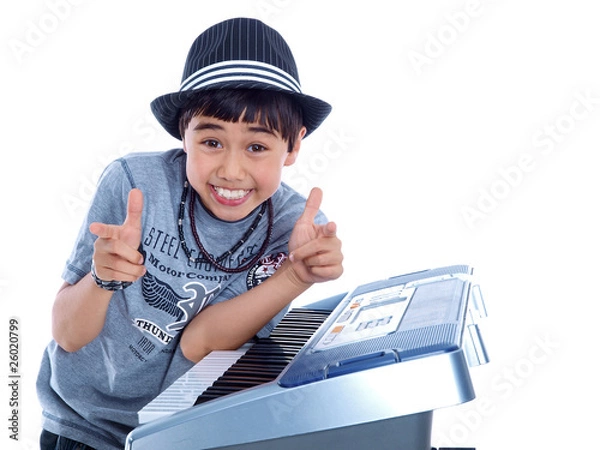 Fototapeta happy child pointing in front isolated on white background