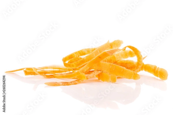 Fototapeta Lot of peel pieces of fresh orange carrot isolated on white background