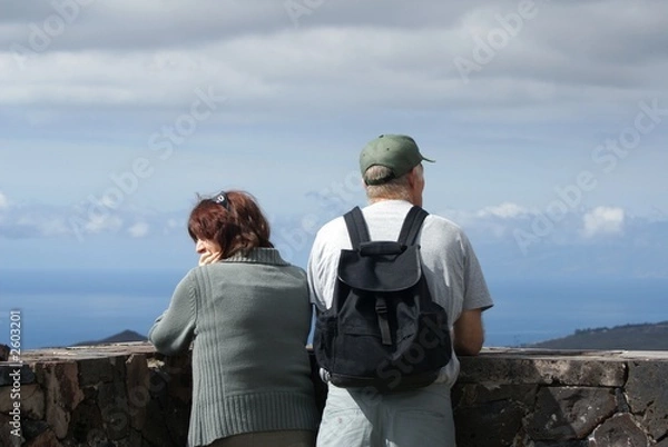 Obraz tourists overlooking the clouds