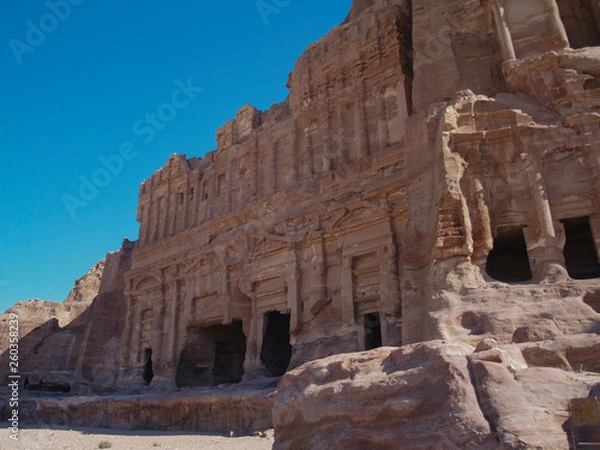 Fototapeta Petra; Raqmu - historic ruins of the ancient, rock city of the Nabatean Arabians. It is located in southwestern Jordan. It is also known as the rose-red city. UNESCO World Heritage list.