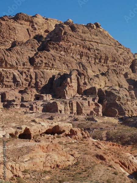 Fototapeta Petra; Raqmu - historic ruins of the ancient, rock city of the Nabatean Arabians. It is located in southwestern Jordan. It is also known as the rose-red city. UNESCO World Heritage list.