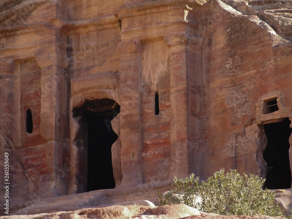 Fototapeta Petra; Raqmu - historic ruins of the ancient, rock city of the Nabatean Arabians. It is located in southwestern Jordan. It is also known as the rose-red city. UNESCO World Heritage list.
