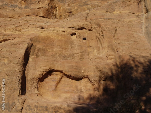 Fototapeta Petra; Raqmu - historic ruins of the ancient, rock city of the Nabatean Arabians. It is located in southwestern Jordan. It is also known as the rose-red city. UNESCO World Heritage list.