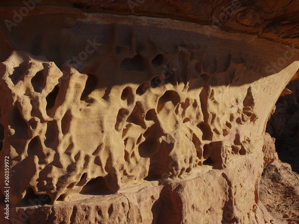 Fototapeta Petra; Raqmu - historic ruins of the ancient, rock city of the Nabatean Arabians. It is located in southwestern Jordan. It is also known as the rose-red city. UNESCO World Heritage list.