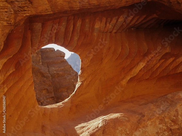 Fototapeta Petra; Raqmu - historic ruins of the ancient, rock city of the Nabatean Arabians. It is located in southwestern Jordan. It is also known as the rose-red city. UNESCO World Heritage list.