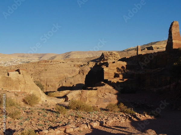 Fototapeta Petra; Raqmu - historic ruins of the ancient, rock city of the Nabatean Arabians. It is located in southwestern Jordan. It is also known as the rose-red city. UNESCO World Heritage list.