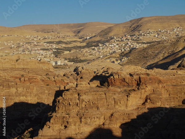 Fototapeta Petra; Raqmu - historic ruins of the ancient, rock city of the Nabatean Arabians. It is located in southwestern Jordan. It is also known as the rose-red city. UNESCO World Heritage list.