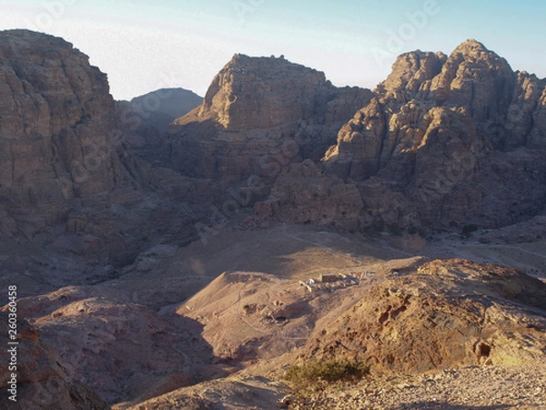 Fototapeta Petra; Raqmu - historic ruins of the ancient, rock city of the Nabatean Arabians. It is located in southwestern Jordan. It is also known as the rose-red city. UNESCO World Heritage list.