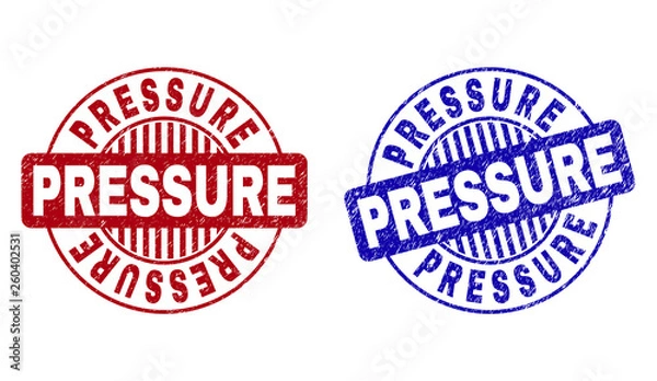 Fototapeta Grunge PRESSURE round stamp seals isolated on a white background. Round seals with distress texture in red and blue colors. Vector rubber overlay of PRESSURE tag inside circle form with stripes.