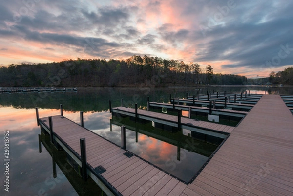 Obraz dock on lake during colorful sunrise