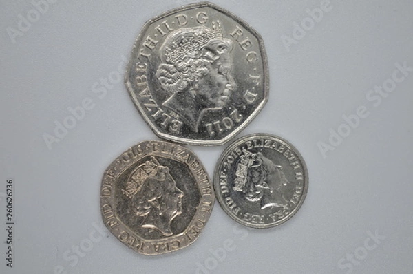 Obraz old coins on white background