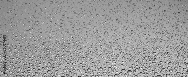 Obraz Drops of water on grey metal window sill.