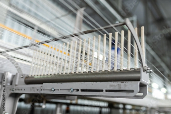 Fototapeta Carpet factory, carpet production, synthetic yarns for weaving looms