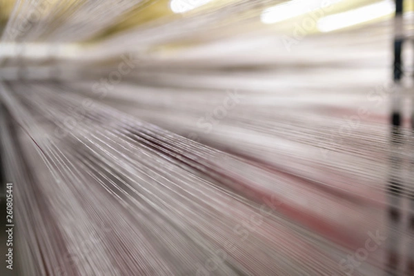 Fototapeta Carpet factory, carpet production, synthetic yarns for weaving looms