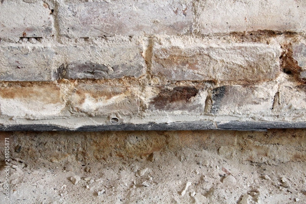 Fototapeta Nachträgliche Horizontalsperre in einer Hauswand