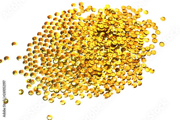 Obraz gold sequins scattered on white background