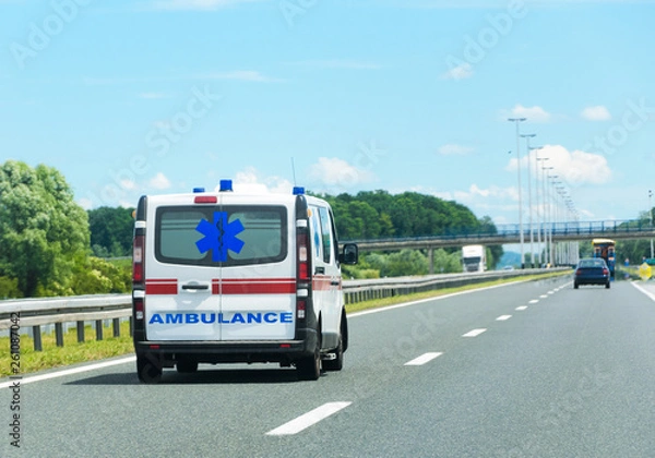 Obraz Ambulance van on road