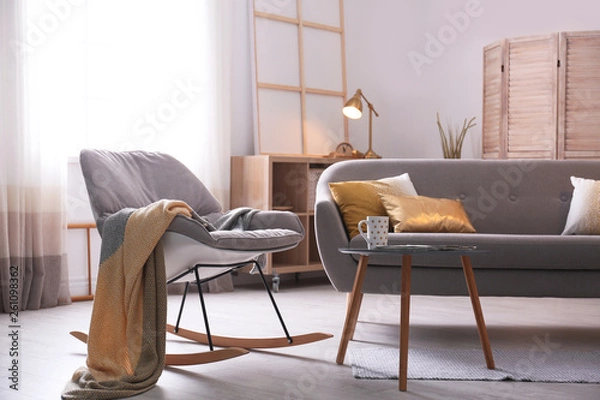Fototapeta Stylish living room interior with comfortable sofa. Idea for home decor
