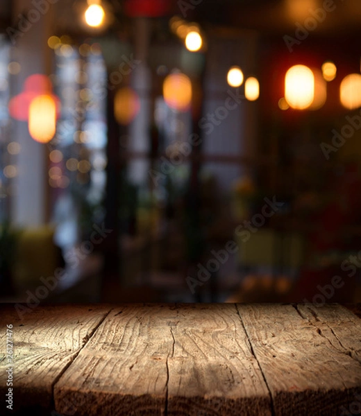 Obraz blurred background of bar and dark brown desk space of retro wood