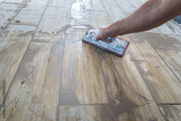 Fototapeta Grouting ceramic tiles