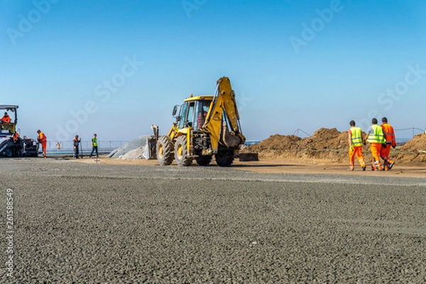 Fototapeta Construction site of road, building or airport with construction machinery (truck, bulldozer, excavator) and construction workers or engineers