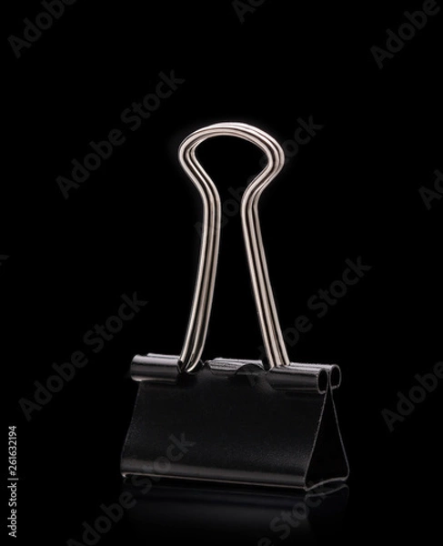 Obraz Black Paper clip isolated on black background