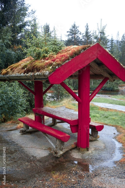 Fototapeta arbor on background of spellbinding landscape of Norwegian nature with high charming mountains and hills