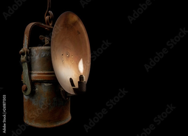Obraz Carbide lamp on black background