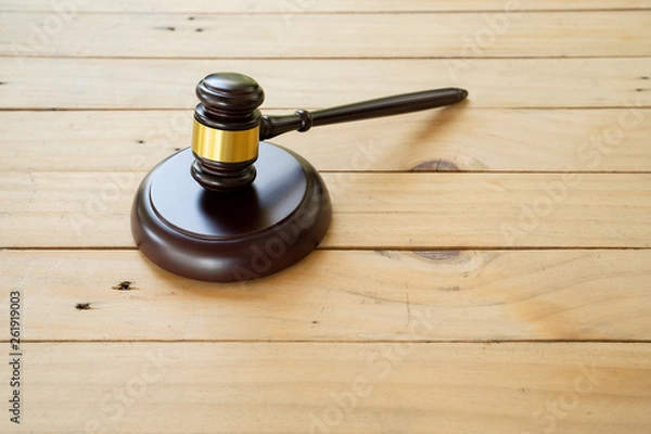 Fototapeta Hammer on the wooden table - picture