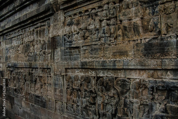 Fototapeta A fragment of the Borobudur Temple wall engravings, Yogyakarta, Indonesia
