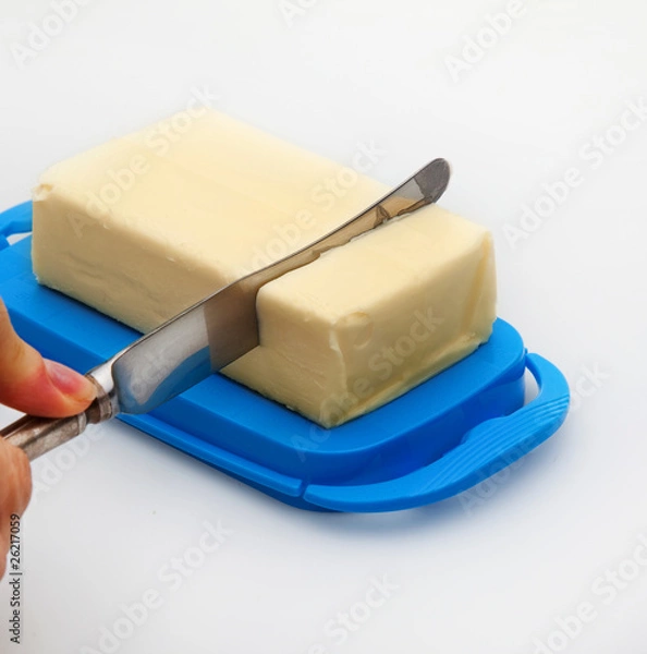 Fototapeta Buter in butterdish