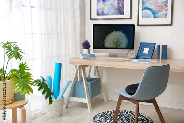Fototapeta Modern workplace interior with computer on table