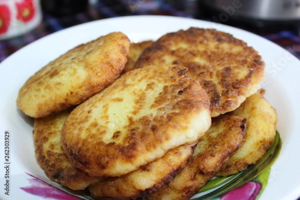 Obraz fried cottage cheese cheesecakes in a plate