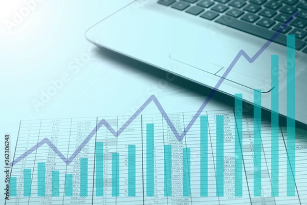Fototapeta Accountant work table with calculator, charts and pen.