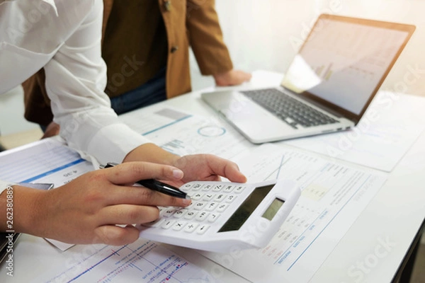 Fototapeta Using computers and calculators to work audit Work planning Checking account balance