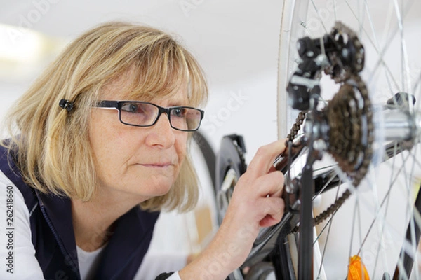 Fototapeta bicycle repair and cleaning process