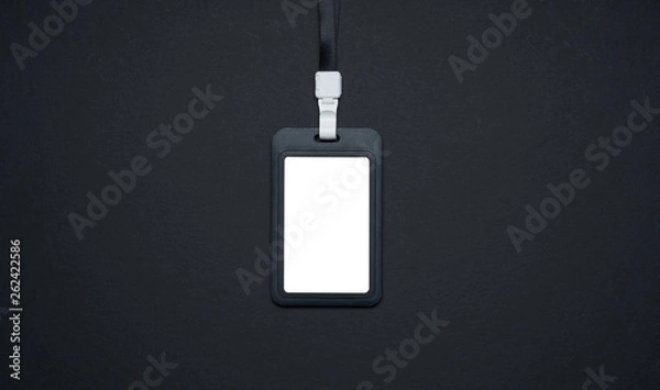 Fototapeta Empty black plain name tag or Business blank badge mockup isolated on black background. Employees identification concept