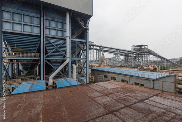 Obraz Industrial buildings in an abandoned factory