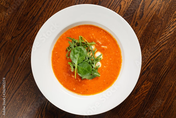 Fototapeta tomato cream soup with shrimps