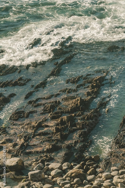 Fototapeta Waves crashing on the rocks