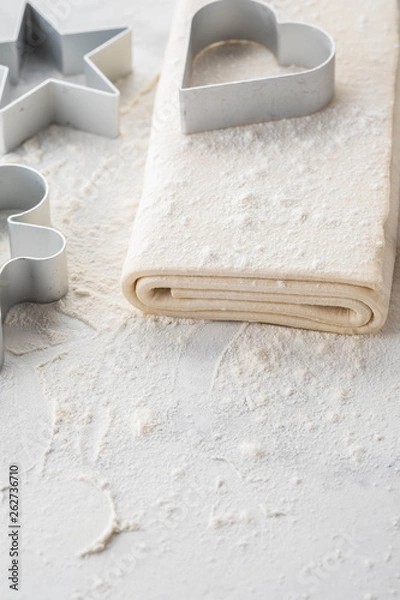 Fototapeta Fresh raw dough on table. Puff pastry. Copy space.
