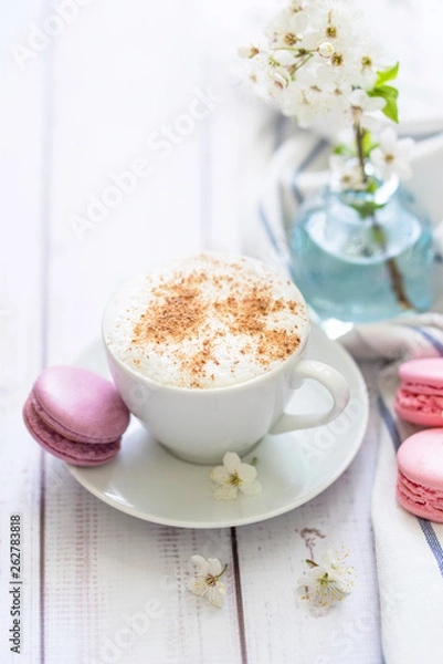 Fototapeta coffee and macaron in white wood background spring breakfast