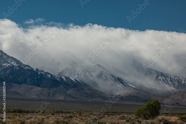 Fototapeta Clouds Engulfing Sierras