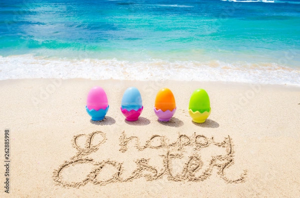 Obraz Happy easter background with color eggs on the beach