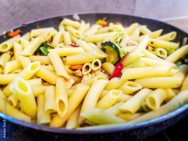Fototapeta Penne with fresh vegetables