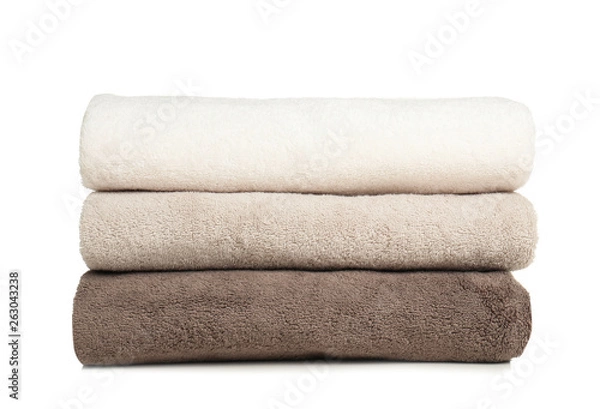 Fototapeta Folded soft terry towels on white background