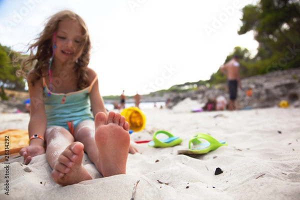 Obraz little girl at a beach. space for copy