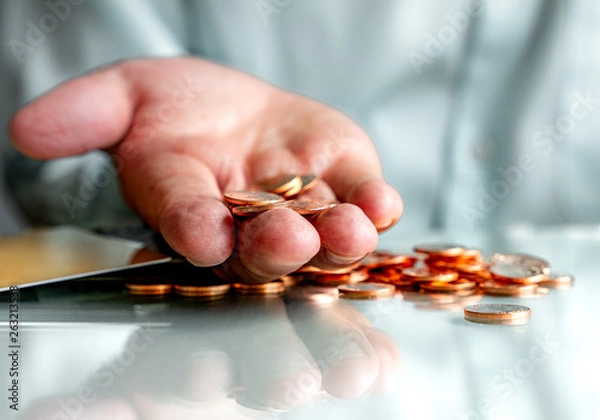 Fototapeta Selective focus of copper coins on hand , Concept for money and business
